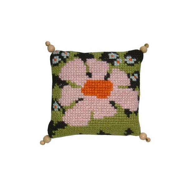 Rosa blomst p� sort bund