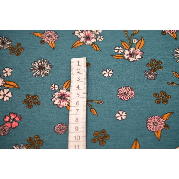 Viscose jersey M�rkegr�n m/blomster