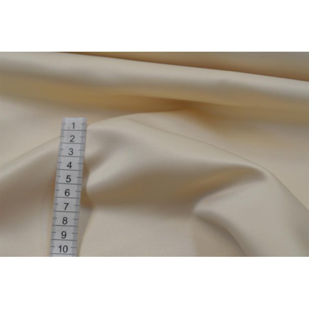 Kraftig brudesatin Champagne